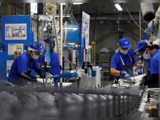 Japan's factories expand output for a second month in July
