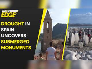 Tourists flock as severe drought in Spain uncovers submerged monuments