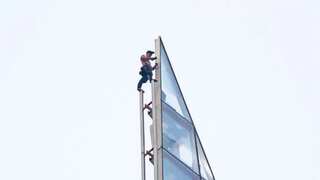 A barefoot and shirtless man was arrested for scaling London's 1,000-feet tall skyscraper The Shard
