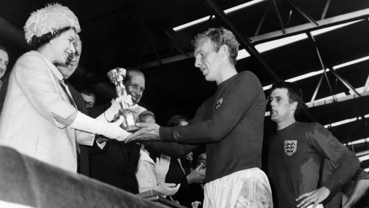 2) Queen Elizabeth II hands Bobby Moore the World Cup trophy