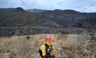 Wildfire-ravaged areas brace for mudslides as storm moves into California