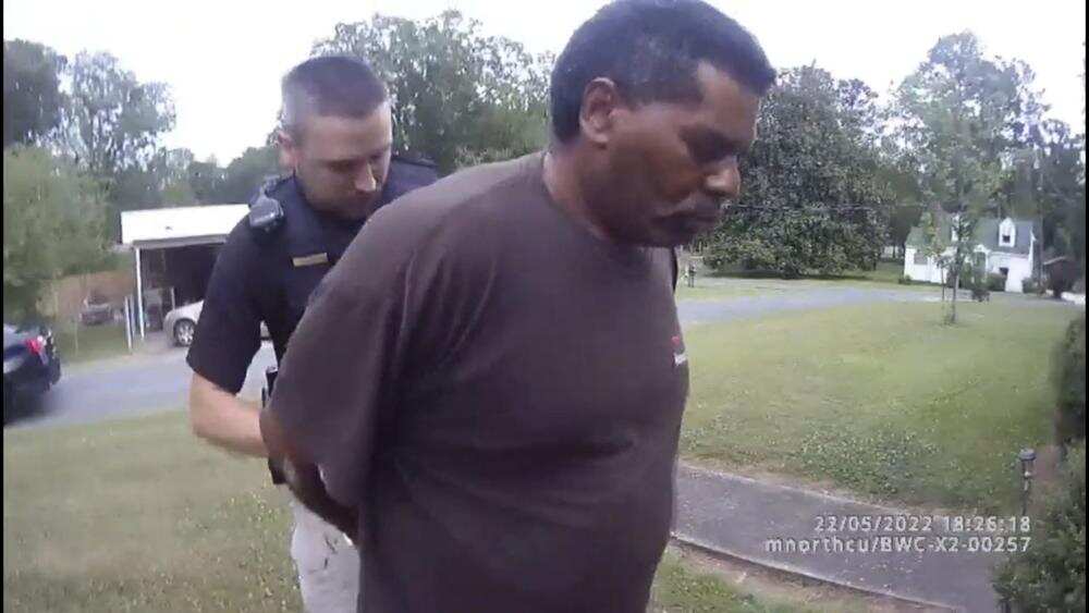 US: Black pastor arrested while watering flowers sues police US: Black pastor arrested while watering flowers sues police