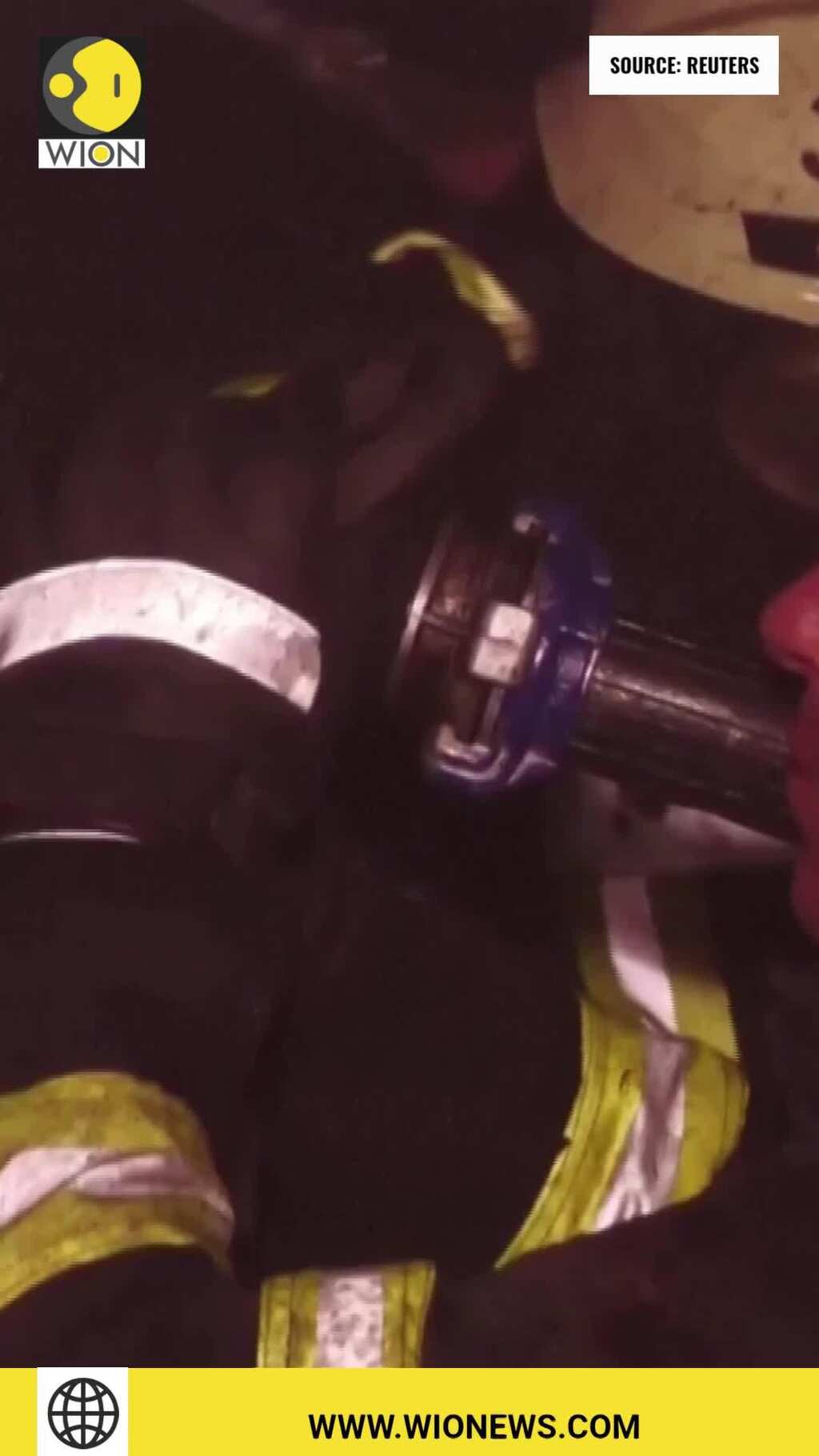 Firefighters battle flames at thermal power plant after missile strikes