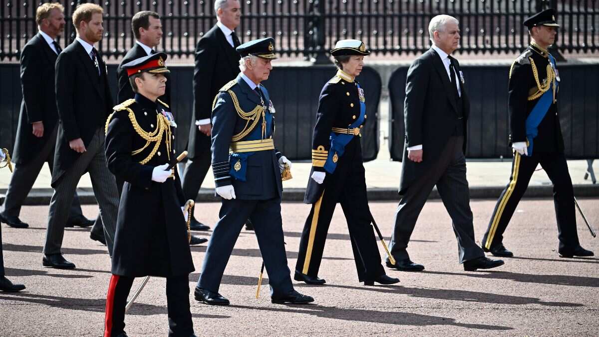 Queen's four children walk together