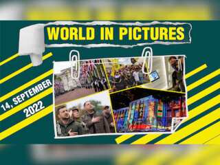 World in Pictures: Palestinians march in Kafr Dan; Zelensky takes part in flag raising ceremony