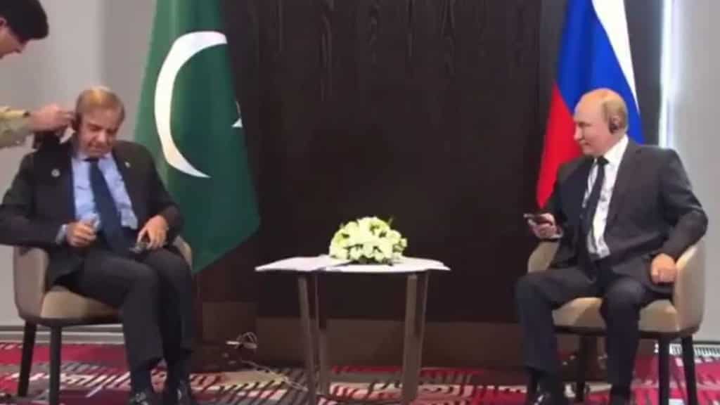 Pakistan PM Sharif's struggle with his earphones leaves Putin amused at the SCO