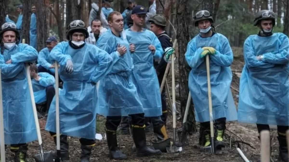 Most bodies at mass burial site have signs of violent death, claims Kyiv