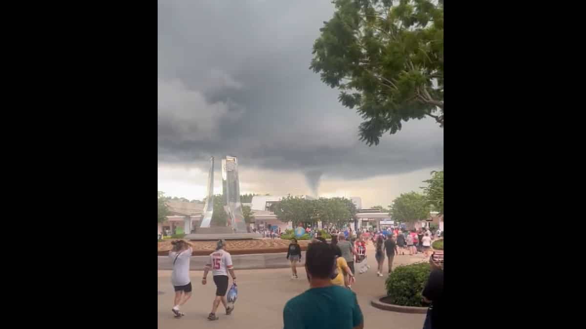 Watch People seek shelter as a funnelshaped cloud looms over Disney