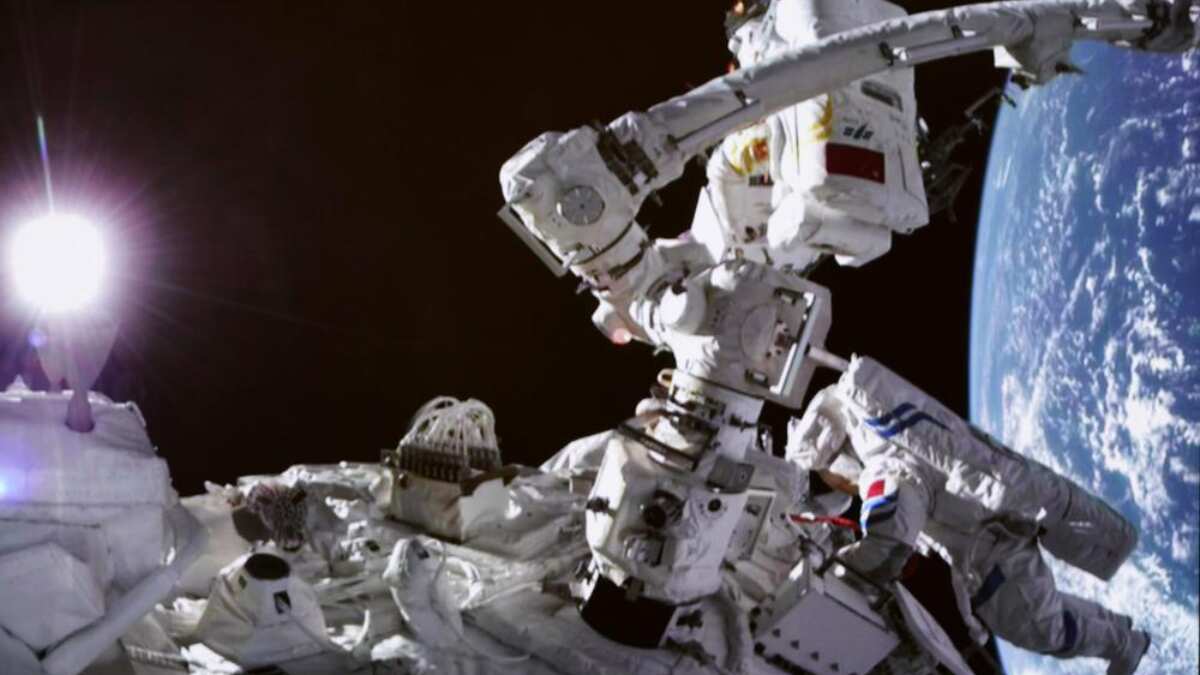 Chinese astronauts Cai Xuzhe, Chen Dong carry out spacewalk from new station