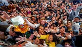 Munich's mayor kicks off Oktoberfest by opening beer keg with hammer