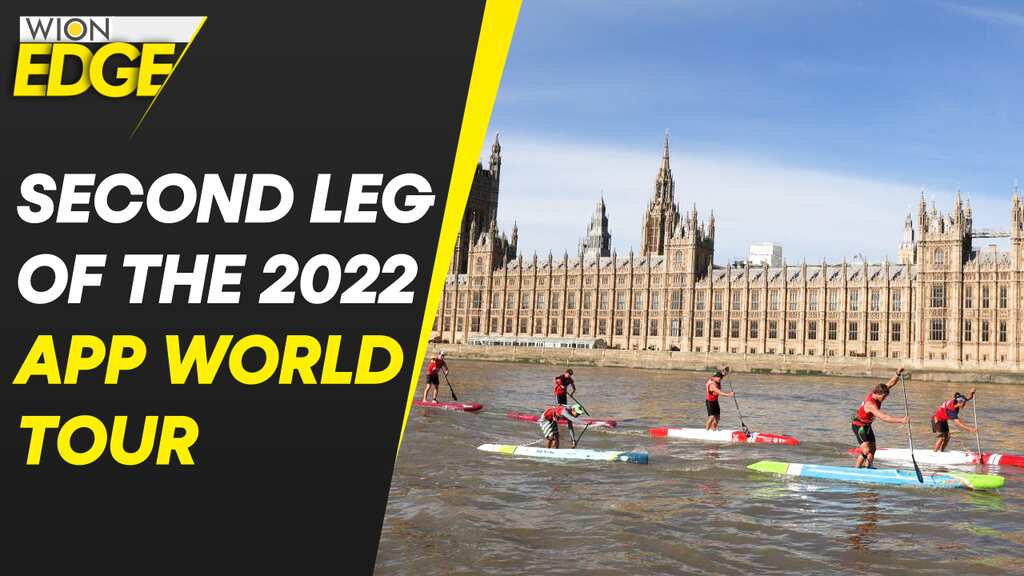 World's best paddleboarders race past London landmarks to mark Queen's passing