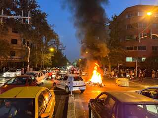 Protests flare across Iran as women cut their hair, burn hijabs to protest Mahsa Amini's custodial death