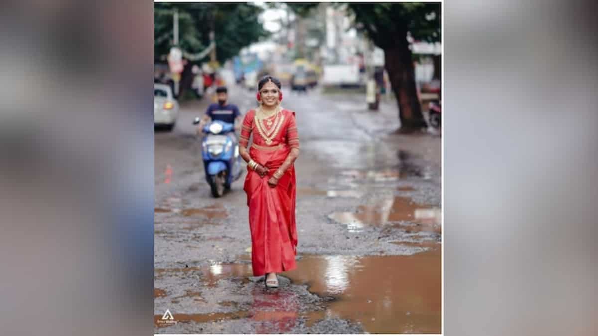 Watch: Indian bride's wedding photoshoot goes viral as she walks on road full of potholes