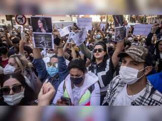 Iran anti-hijab protest: Iranian police battle protesters in Tehran