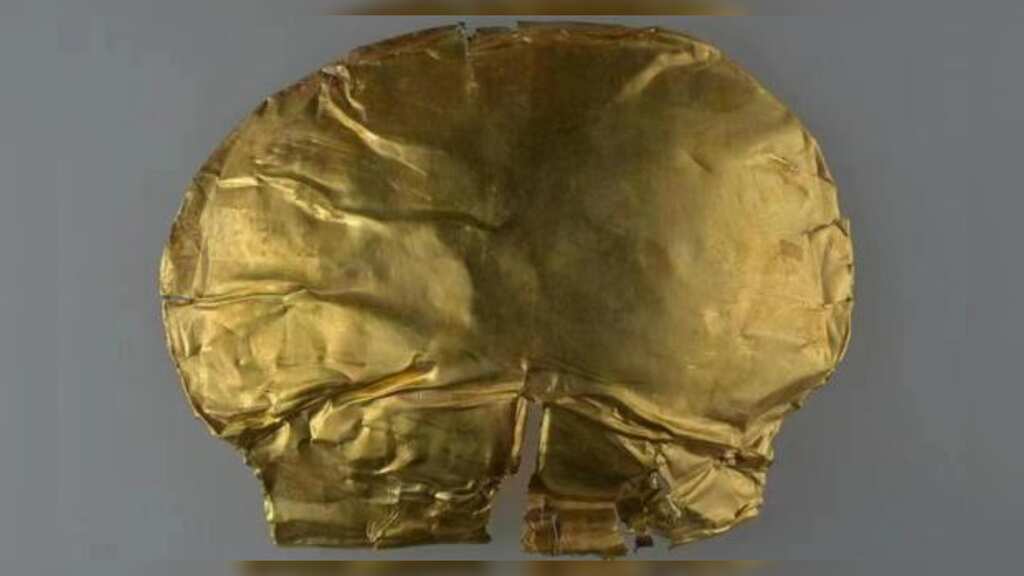 Archaeologists unearth China's 'oldest gold object', a funeral mask