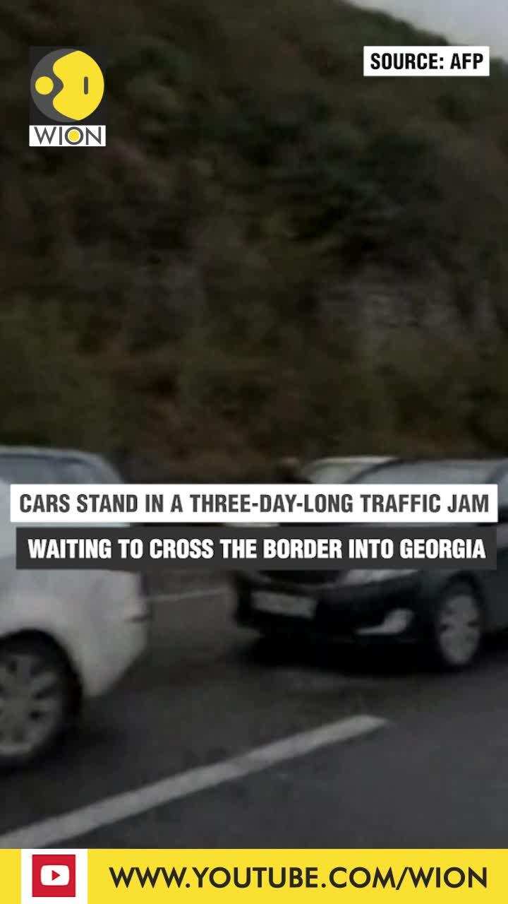 Cars queue for three days, others cross on foot at Russia-Georgia border