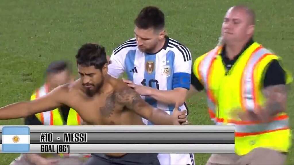 WATCH: Lionel Messi nearly taken down by security as he tries to sign pitch invader's bare back in USA