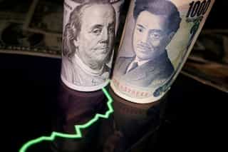 China’s yuan slides to record 14-year low against US dollar