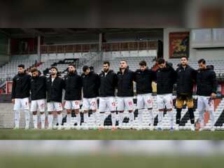 Iranian football team cover emblem in solidarity with protests over Mahsa Amini’s death