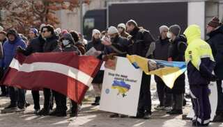 Latvians vote for parliamentary elections, polls predict PM Karin's victory