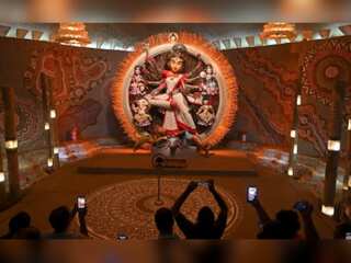 The festive spirit of Durga Puja: Innovative 'Pandals' attract big crowds