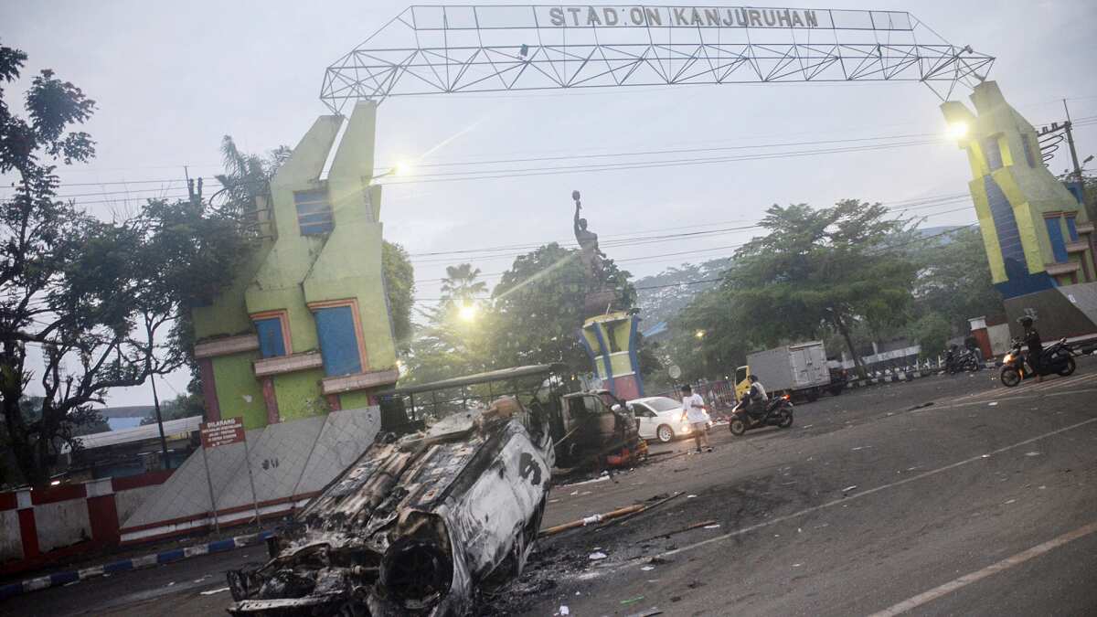 Police vehicles destroyed inside and outside the stadum