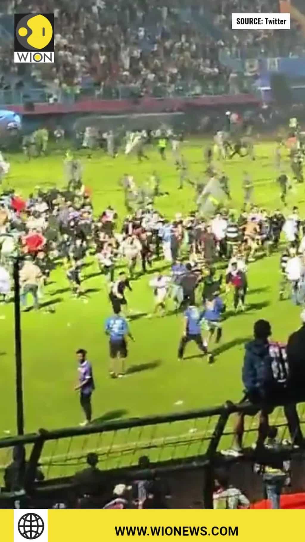 At least 174 people dead after stampede at a football stadium in Indonesia