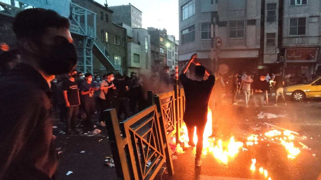 Riot police in Tehran clash with students protesting Mahsa Amini's death