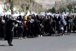 Female students protest against the deadly Kabul attack as toll jumps to 43