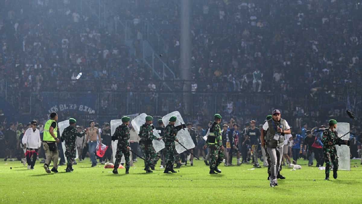 32 children among 125 dead, nine police officers suspended after Indonesia stadium disaster