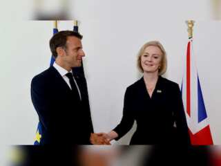 Macron's European political community debuts in Prague; Liz Truss attends summit