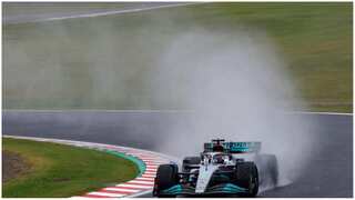 Briton George Russell and Lewis Hamilton lead F1 practice in soaking Suzuka