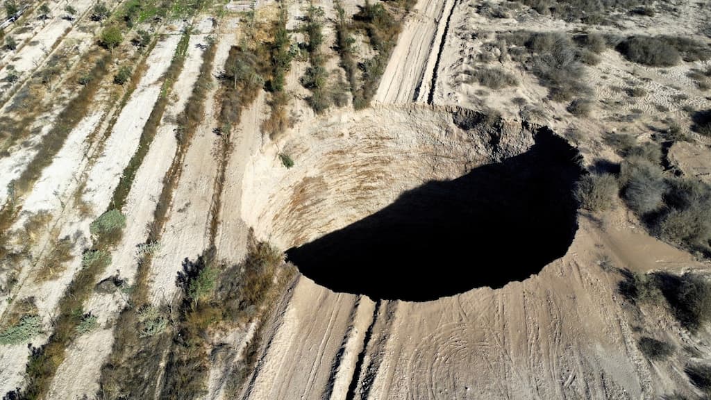 Chile announces permanent closure of mining areas connected to giant sinkhole