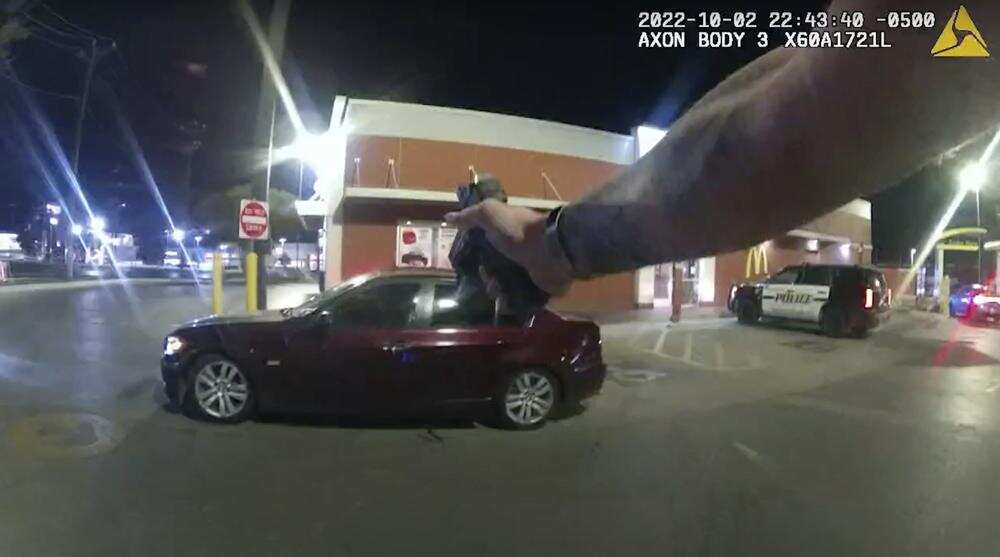 Watch: US cop shoots at teenager eating burger in car Watch: US cop shoots at teenager eating burger in car