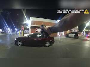 Watch: US cop shoots at teenager eating burger in car