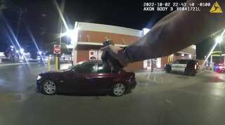 Watch: US cop shoots at teenager eating burger in car