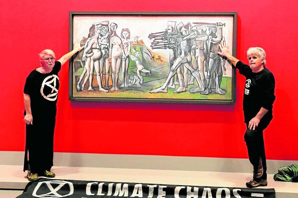 WION Climate Tracker | Activists glue their hands to Picasso's 'Massacre in Korea'