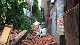Three-storey building collapses in Indian state of Uttar Pradesh following heavy rains