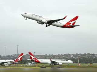 World Business Watch: Qantas shares surge as it forecasts stronger-than-expected first-half profit