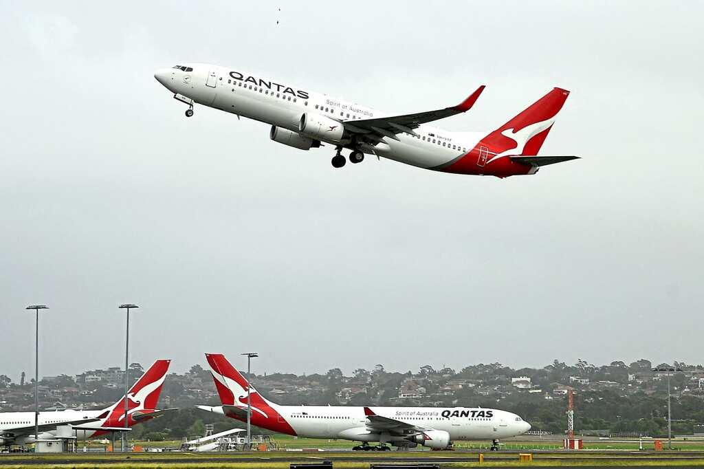 World Business Watch: Qantas shares surge as it forecasts stronger-than-expected first-half profit