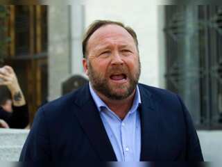 Infowars owner Alex Jones ordered to pay Sandy Hook victims' families $965 mn over hoax claims