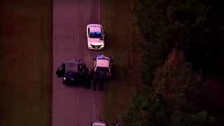 Shooting rampage in North Carolina leaves 5 dead, including a police officer, suspect held