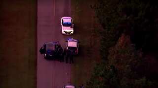 Shooting rampage in North Carolina leaves 5 dead, including a police officer, suspect held