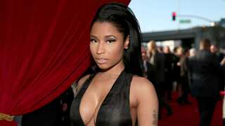 Nicki Minaj accuses Grammys of treating artists differently as it moves 'Super Freaky Girl' from Rap to Pop