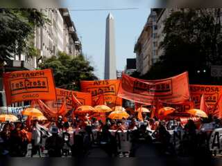 Argentina Economic Crisis: Residents search through garbage piles for food and clothes