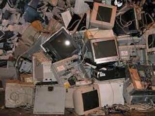 Volunteers in Amsterdam repair electronics in cafe on International e-waste day
