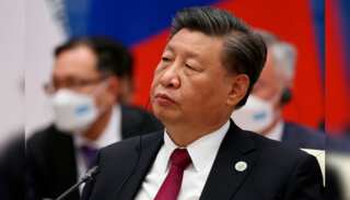 China vows to not renounce use of power, Xi says will ensure Taiwan reunification with mainland