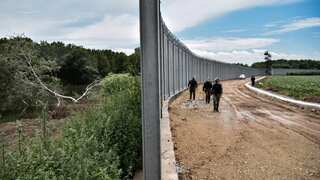 UNHCR 'deeply distressed' by reports of 92 naked migrants at Greece-Turkey border as neighbours exchange blame