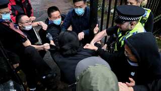 China blames 'disturbing elements' for illegally entering UK consulate and beating man