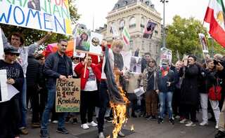 Thousands march in US, Europe to support Iran's anti-hijab protests